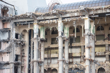 Destroyed building after demolition, man-made accident. Engineering and construction errors.