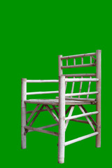 Isomatic view of chair made from bamboo on green background.