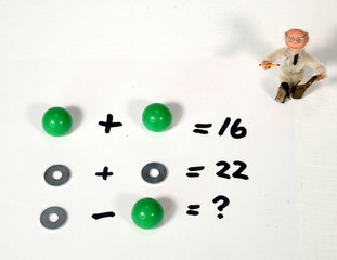 Calculation riddle arrangement with a watching tutor.