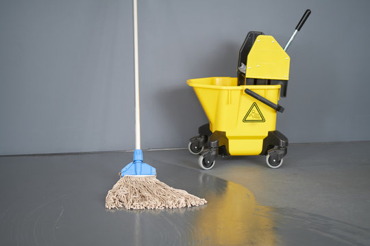 Mop and bucket, janitorial service.