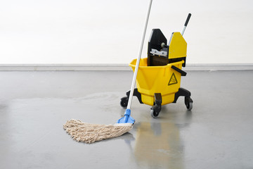 Mop and bucket, janitorial service.