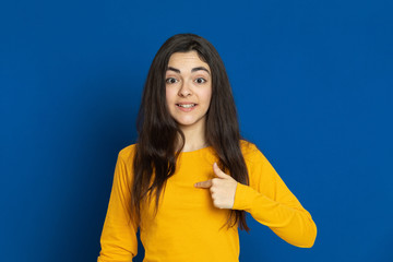 Fototapeta na wymiar Brunette young girl wearing yellow jersey