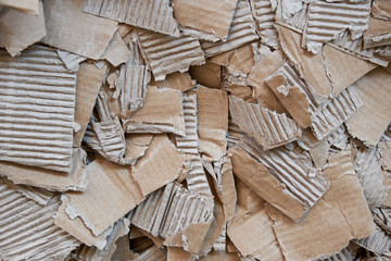 Pressed cardboard for recycling
