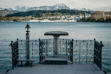 A view point from the pier in lake Lucerne to Alps mountains in town of Luzern Switzerland, Europe