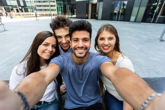 Group of friend taking a selfie picture together, point of view