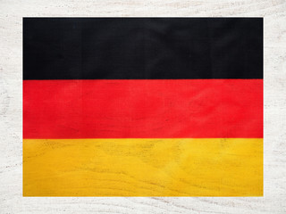 German Flag. Beautiful greeting card. Close-up, view from above. National holiday concept. Congratulations for family, relatives, friends and colleagues