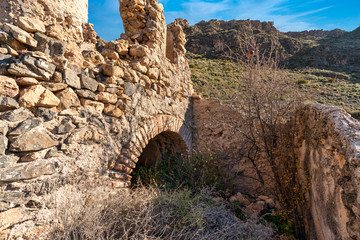 ruins of buildings in the El Cid ravine (Berja) Spain