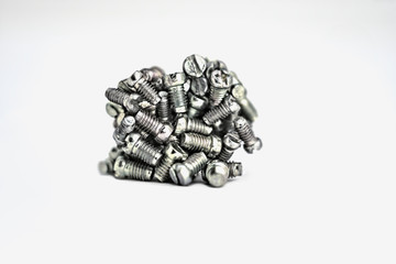Pile of bolts on a white background