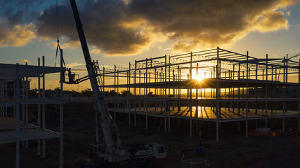 sunset over the construction