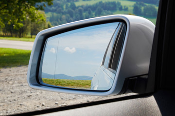Closeup of car mirror.
