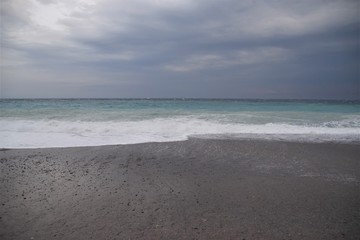 Fototapeta premium Sea beach horizon coast scenic view overcast sky