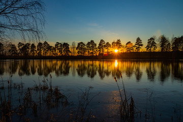 Beautiful sunset on river Kymijoki in February, Finland.