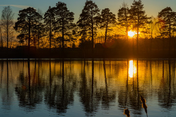 Beautiful sunset on river Kymijoki in February, Finland.