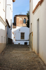 Fototapeta na wymiar narrow cosy street in the old medieval town of Guadix, Spain