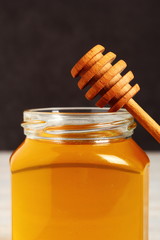 Jar of Honey with Honey Dipper