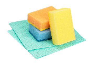 multi-colored dishwashing sponges and napkins isolated on white
