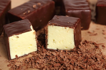 Soft chocolate covered candy filled with soft lemon meringue