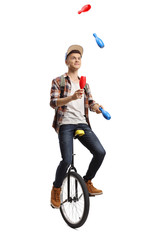Young male student juggling on a unicycle © Ljupco Smokovski