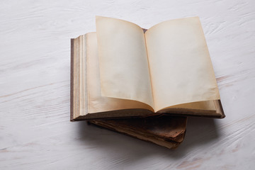 Open old book with blank pages