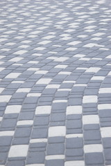 asphalt gray-white tile, textured surface