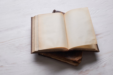 Open old book with blank pages