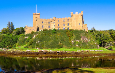Dunvegan, Scotland / United Kingdom - August 25, 2014: The Dunvegan Castle on the shore of Loch Dunvegan