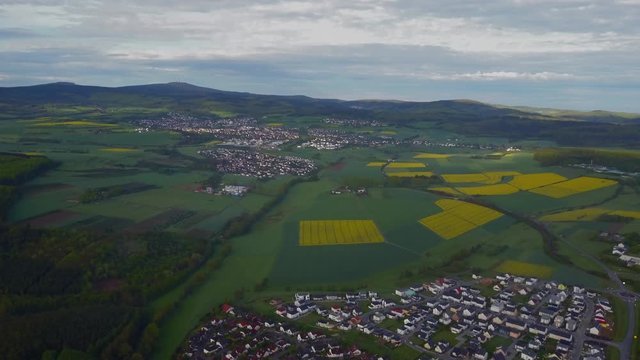 AERIAL: Flight over Typical European, German Agriculture Field on Overcast Cloudy Day 