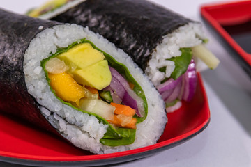 sushi burrito on a plate