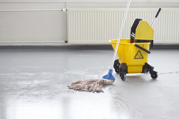 Mop and bucket, janitorial service.