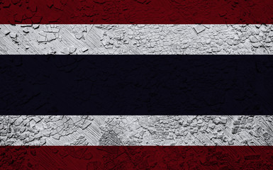 Thailand flag on crumbled wall