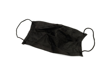 Isolated of black used mask for protection coronavirus on white background.