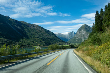 Norwegian mountain road with Josteldalsbreen glacier in the background