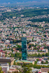 Millennium Hotel, old town and modern architectureand ,  view from Mt Mtatsminda. Tbilisi. Georgia.