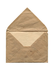 front view of old open aged paper envelope isolated on white