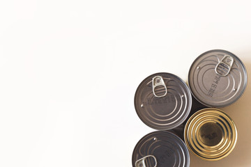 Tin, canned food isolated on white. Stock and proviant concept. Long-term storage products.