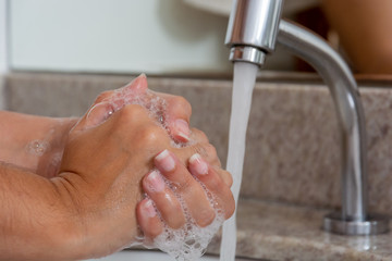 Fototapeta premium washing hands with soap for hygiene and health care to prevent covid19 corona virus 21