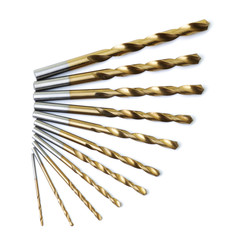 Top view of a set of drill bits on a white background