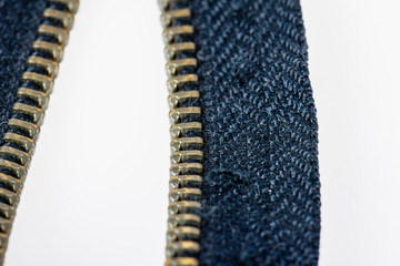 Closeip of old jeans zipper.