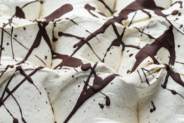 Stracciatella flavour gelato - full frame detail. Close up of a white surface texture of...