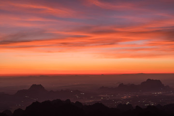 View of the sunrise over the countryside from the summit of Mt. Zwegabin, Hpa-An, Myanamr