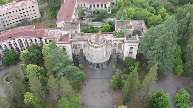 The ruins of the old Soviet sanatorium, whose architecture which is basically a synthesis of Stalinist period classical style and of Georgian ethnic decor with Gothic and Roman features.