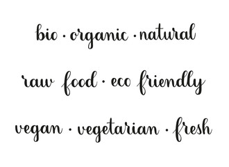 Bio, organic, eco, natural, raw food, eco friendly, vegan, vegetarian, fresh. Handwritten set of vector signs or logos. Brush calligraphy style