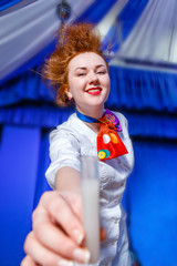 Crazy professor animator at the festival entertains children and conducts experiments.
