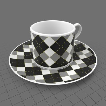 Tartan patterned cup and saucer