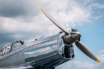 Retro airplane close-up with a single propeller.