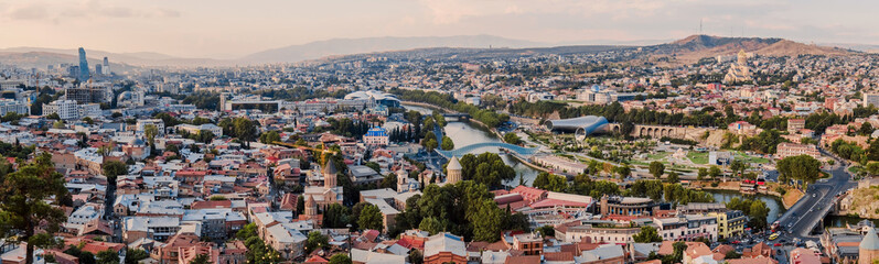 Fototapeta na wymiar Tbilisi, Georgia. Panoramic beautiful picture of Cityscape Of Summer Old Town. Central Part Of City With Famous Landmarks.