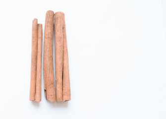 Cinnamon sticks on a white background