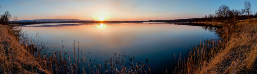 Panorama lake view in sunrise time /Sunrise at the lake