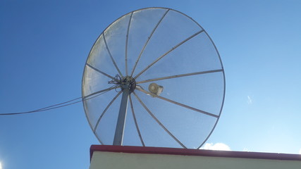 satelite dish on top the building