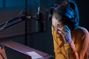 Professional radio host working in the studio